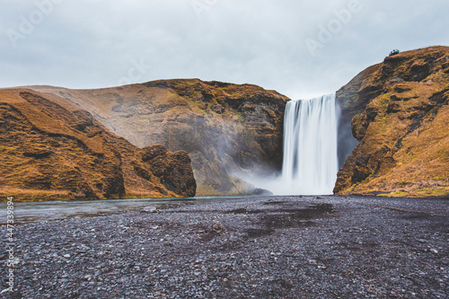 Skogafoss waterfall, long exposure landscape. Iceland in autumn