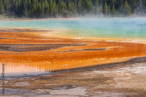 Steam coming of the Beautiful Orange and Blue Yellowstone National Park Opal Prismatic Pool