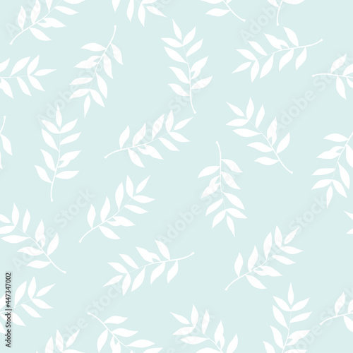 Seamless leaves pattern. Vector repeating botanical background. White leaves on pastel blue background.