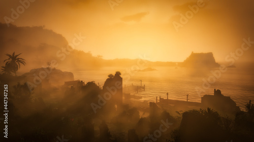 Sunrise over the fort of Guarma. Tropical island