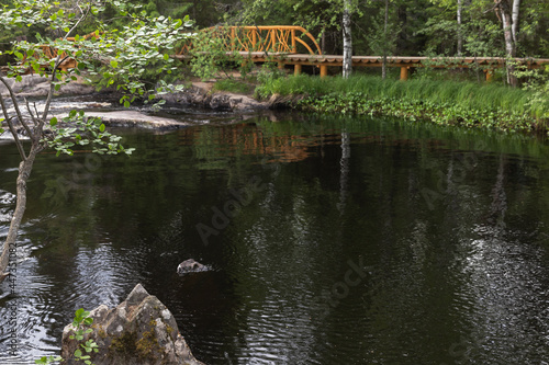 Ruskeala park. Karelian summer landscape with still lake