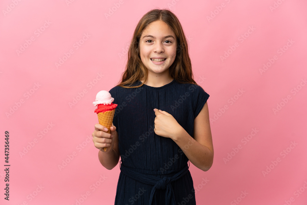 Child with a cornet ice cream over isolated pink background with surprise facial expression Child with a cornet ice cream over isolated pink background with surprise facial expression