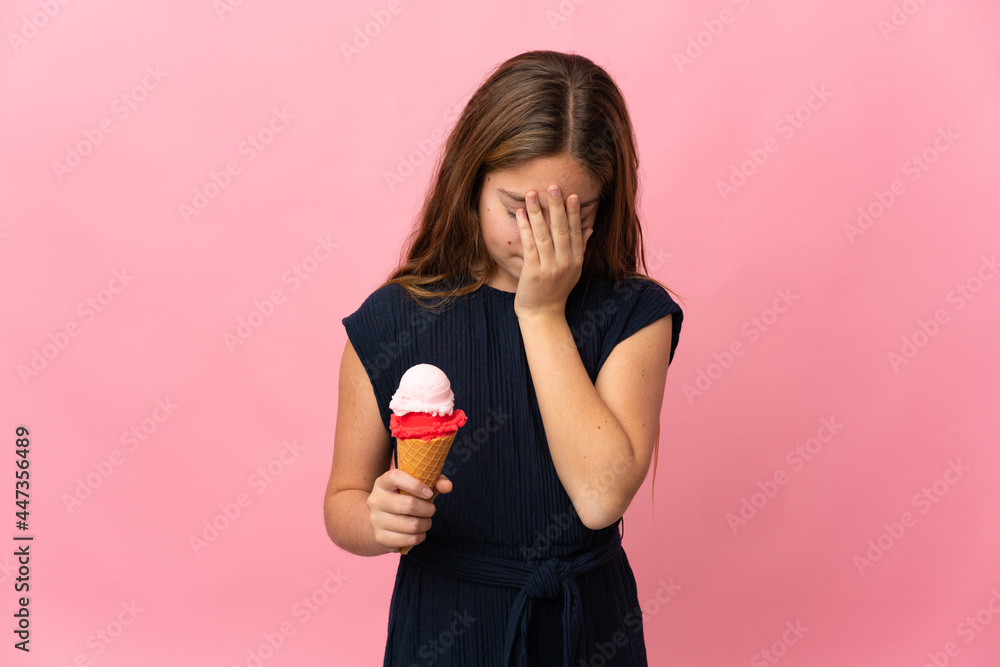 Child with a cornet ice cream over isolated pink background with tired and sick expression Child with a cornet ice cream over isolated pink background with tired and sick expression