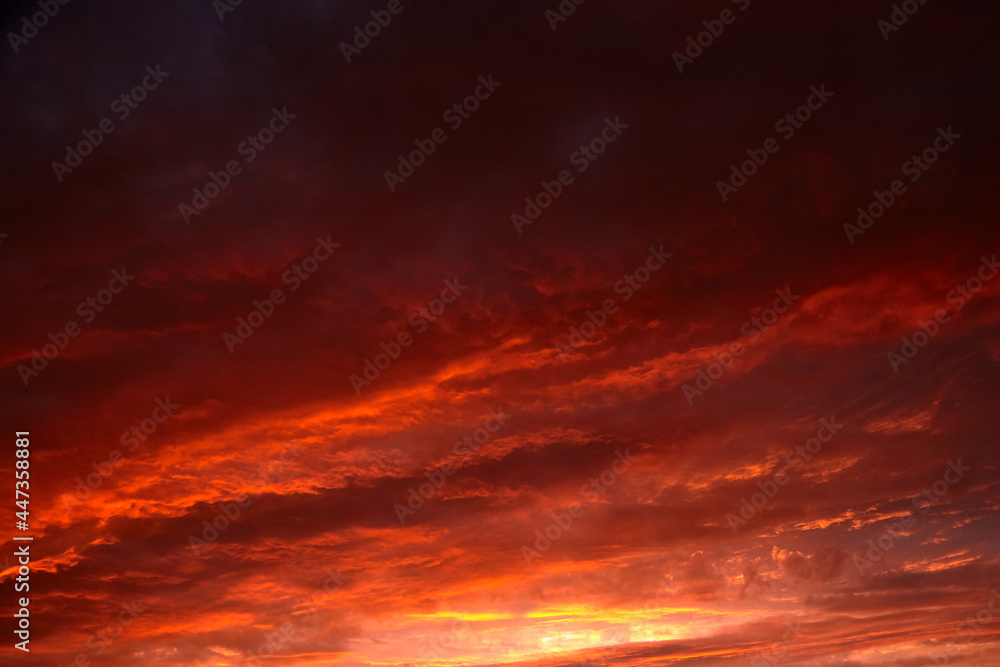 Red sunset sky with dramatic clouds