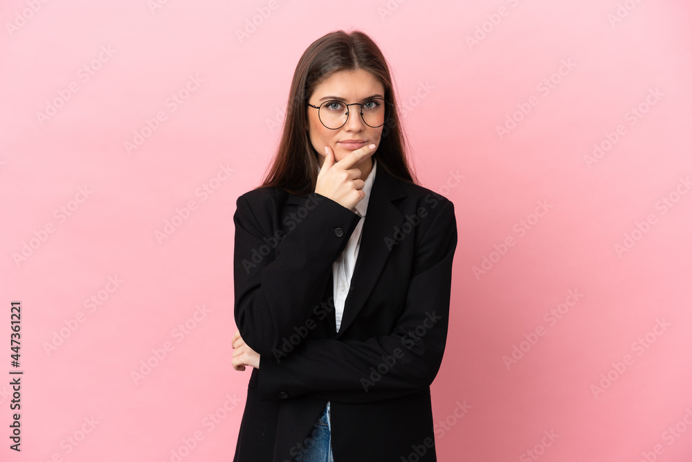 Young Business caucasian woman isolated on pink background thinking Young Business caucasian woman isolated on pink background thinking