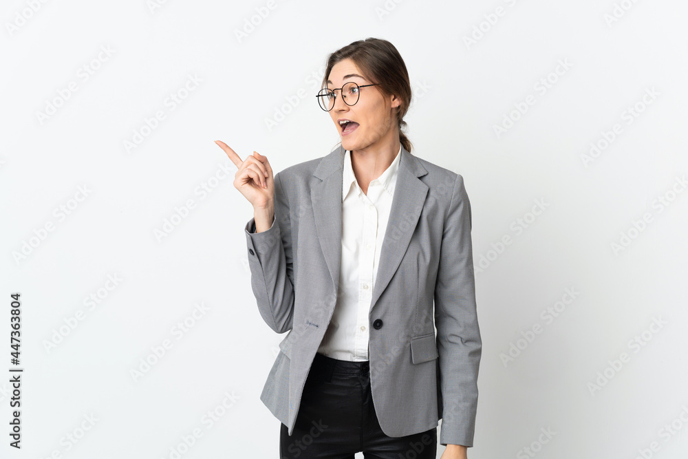 Business Ireland woman isolated on white background intending to realizes the solution while lifting a finger up Business Ireland woman isolated on white background intending to realizes the solution while lifting a finger up