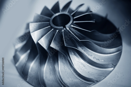 Macro steel blades of turbine propeller blue color photo