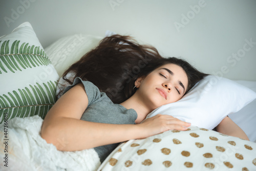 sleepy young woman relaxing...