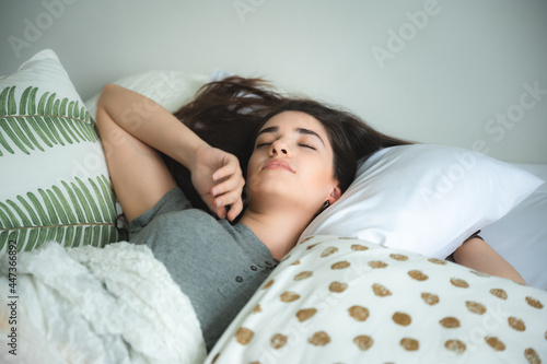 sleepy young woman relaxing...