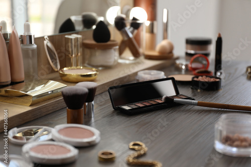 Fotografering Many different cosmetic products on dressing table indoors