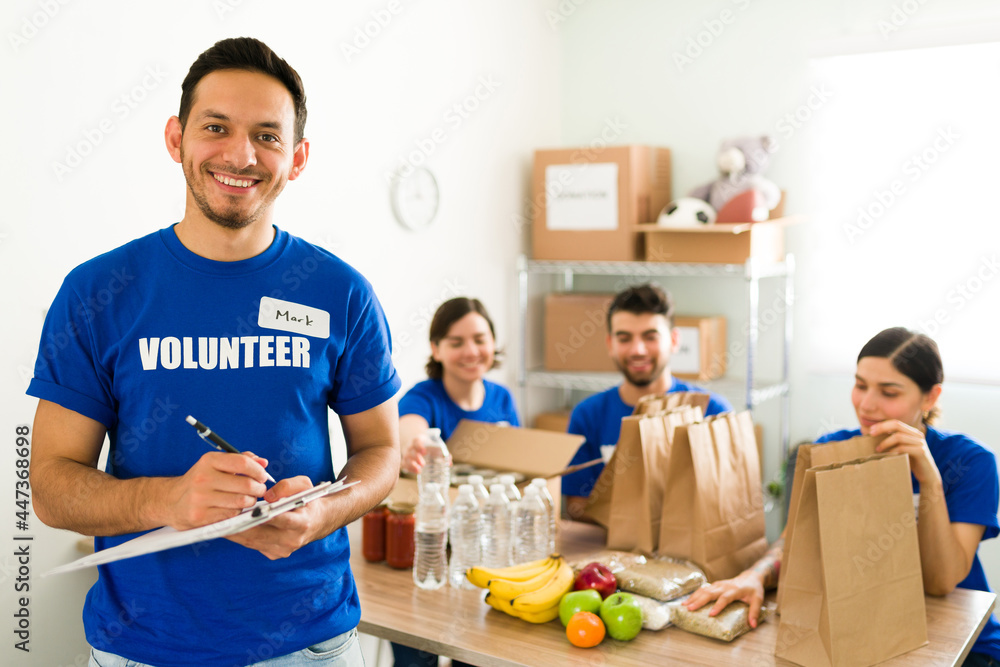 Young man feeling proud to do community work