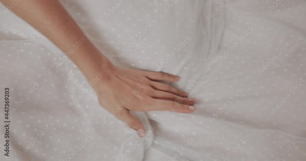 bride in wedding dress in the morning. Strokes the dress with her hand bride in wedding dress in the morning. Strokes the dress with her hand