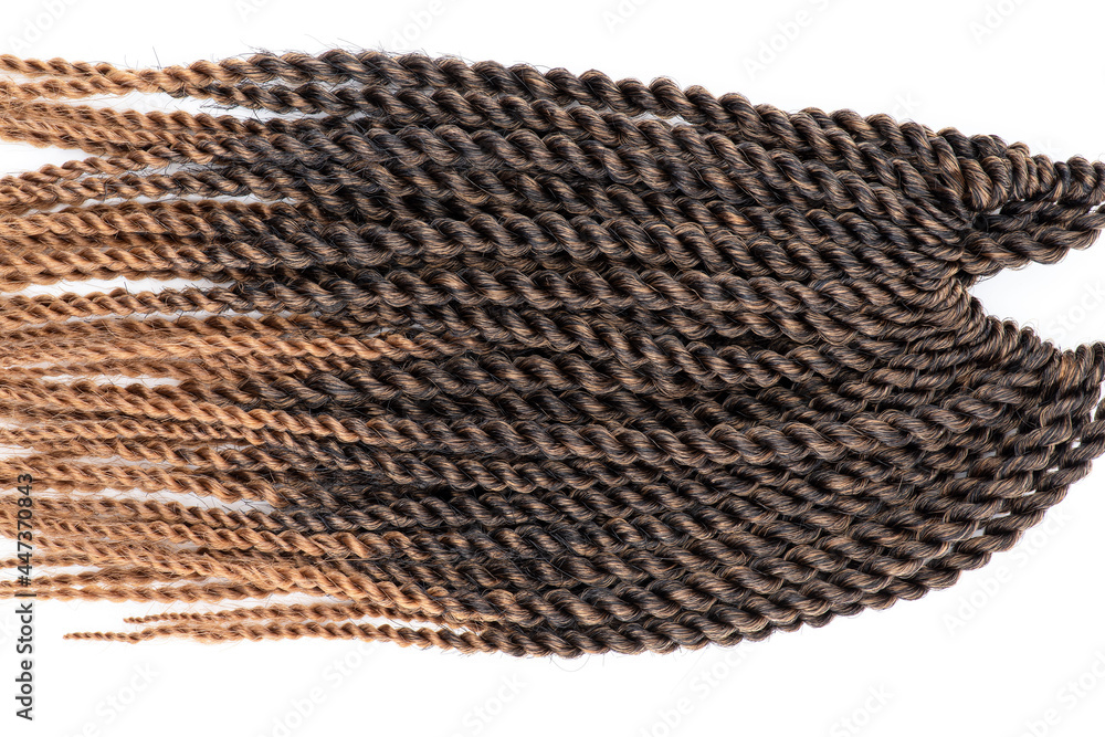 Close-up of brown hair extension braids Close-up of brown hair extension braids