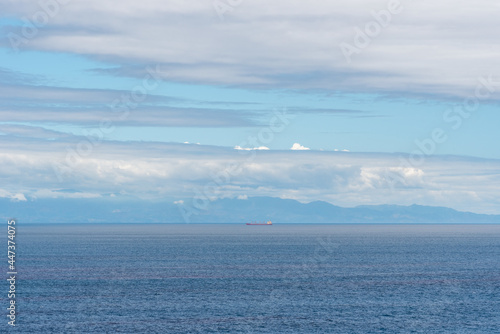 Pacific Ocean landscape, calm blue sea near American coast. 