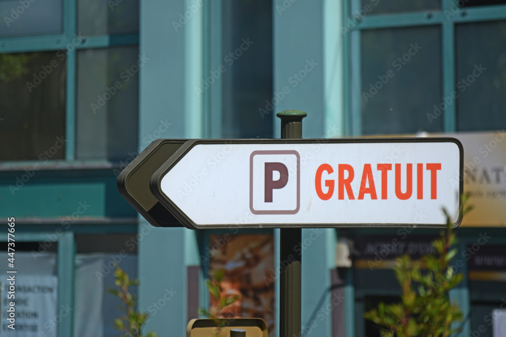 Obraz premium Panneau flèche parking gratuit.