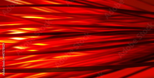 Banner with blurred defocused Halloween horizontal background. Bundle of hay or straw or brushwood or sticks backlighted by red lamp like a fire. Dark red and orange lines.
