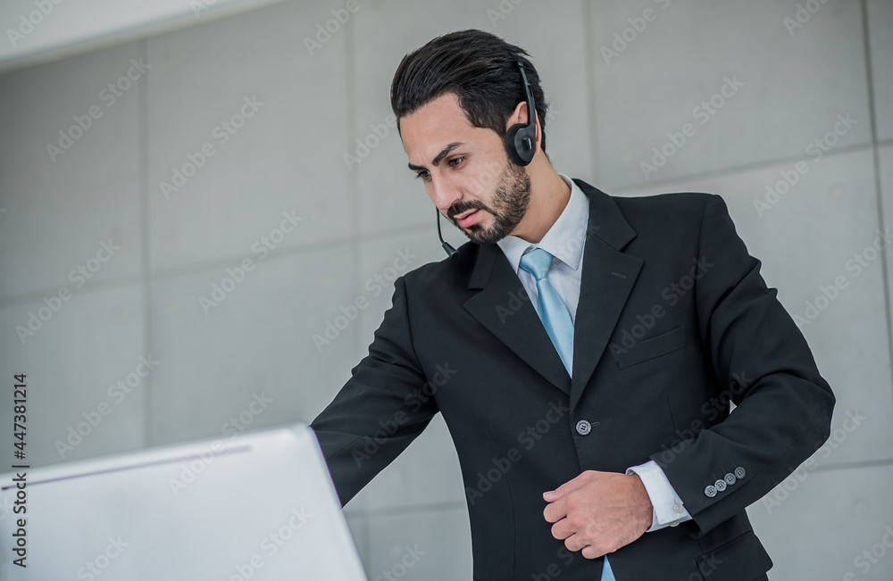 business man use headphone meeting conference and touch screen on computer with copy space business man use headphone meeting conference and touch screen on computer with copy space