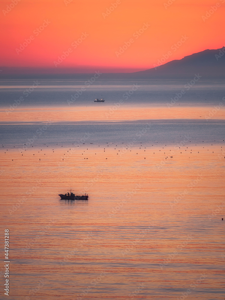 Hokkaido,Japan - June 22, 2021: Beautiful sky of Nemuro strait and Kunashiri island at dawn

