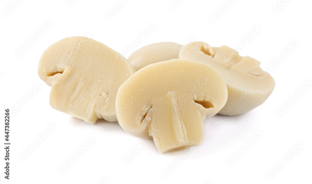 Cut delicious marinated mushrooms isolated on white Cut delicious marinated mushrooms isolated on white