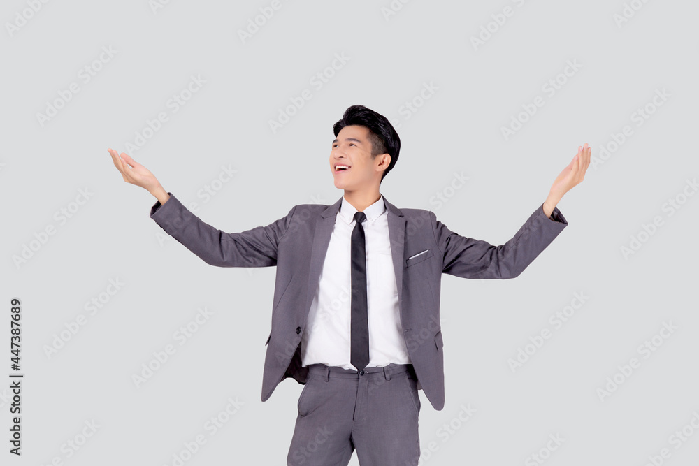 Portrait businessman in suit standing with win success isolated on white background, young asian business man is manager or executive having confident and excited is positive, expression and emotion. Portrait businessman in suit standing with win success isolated on white background, young asian business man is manager or executive having confident and excited is positive, expression and emotion.