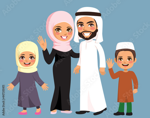 Happy four member Muslim fa...