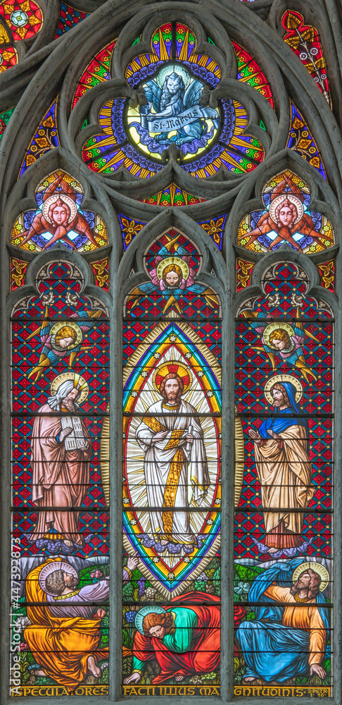 VIENNA, AUSTIRA - JUNI 24, 2021: The  Transfiguration on the stained glass in the Votivkirche church originaly by workrooms from Austria (19. cent.).
