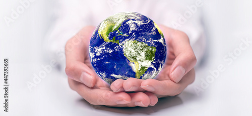 Fototapeta Naklejka Na Ścianę i Meble -  earth in hands. green planet on hand. save of earth. environment concept for background web or world guardian organization.Elements of this image furnished by NASA