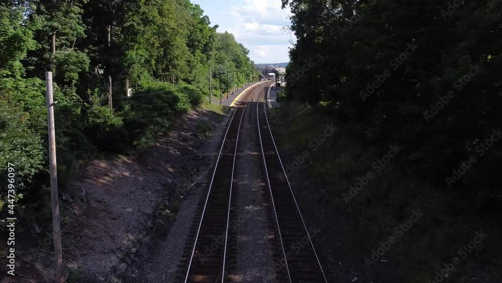 Heading over train tracks towards a MBTA commuter rail station in Norwood, Massachusetts. Heading over train tracks towards a MBTA commuter rail station in Norwood, Massachusetts.
