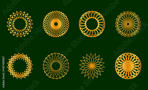 Gold ornament design set on dark green background