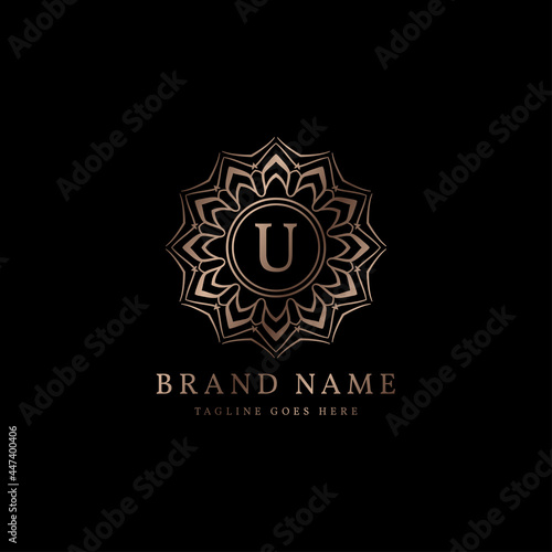 abstract round luxury letter U logo design for elegant fashion brand  beauty care  yoga class  hotel  resort  jewelry