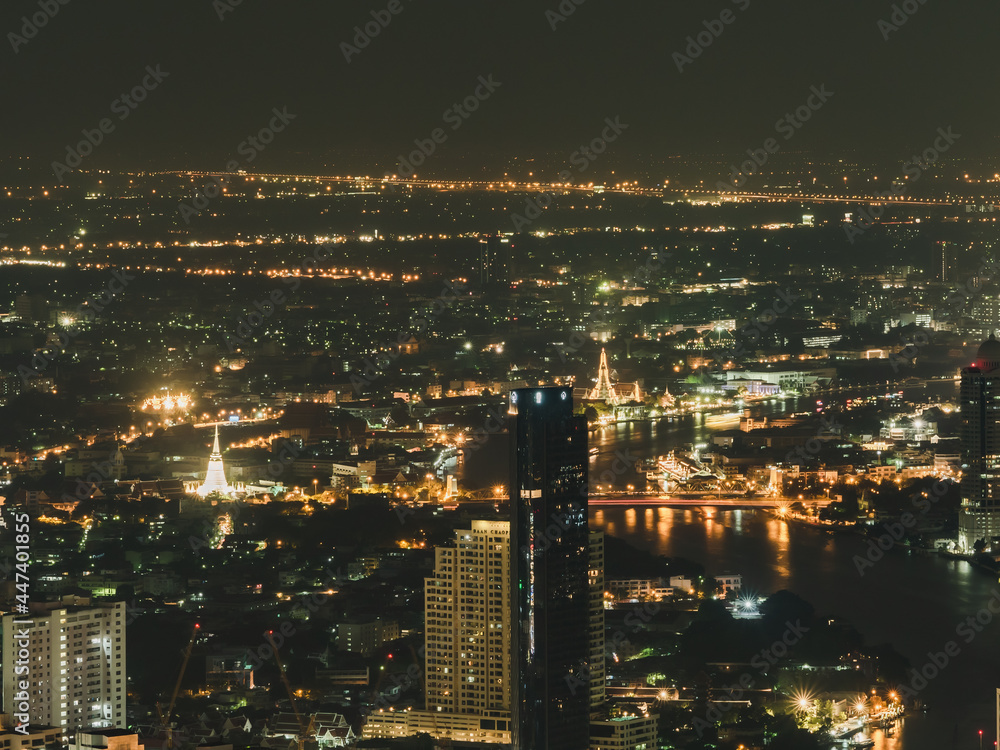 Cityscape Bangkok downtown at night, from the top of King Power Mahanakhon ,Thailand. long exposure