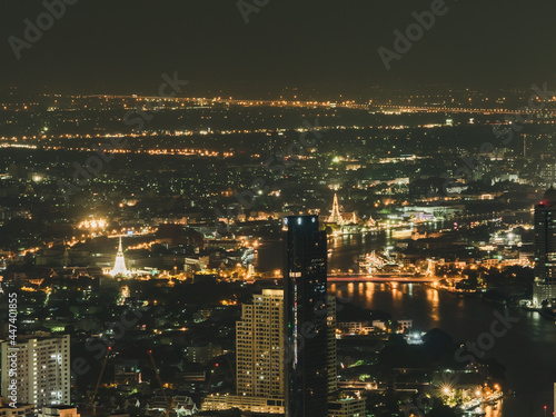 Cityscape Bangkok downtown at night, from the top of King Power Mahanakhon ,Thailand. long exposure