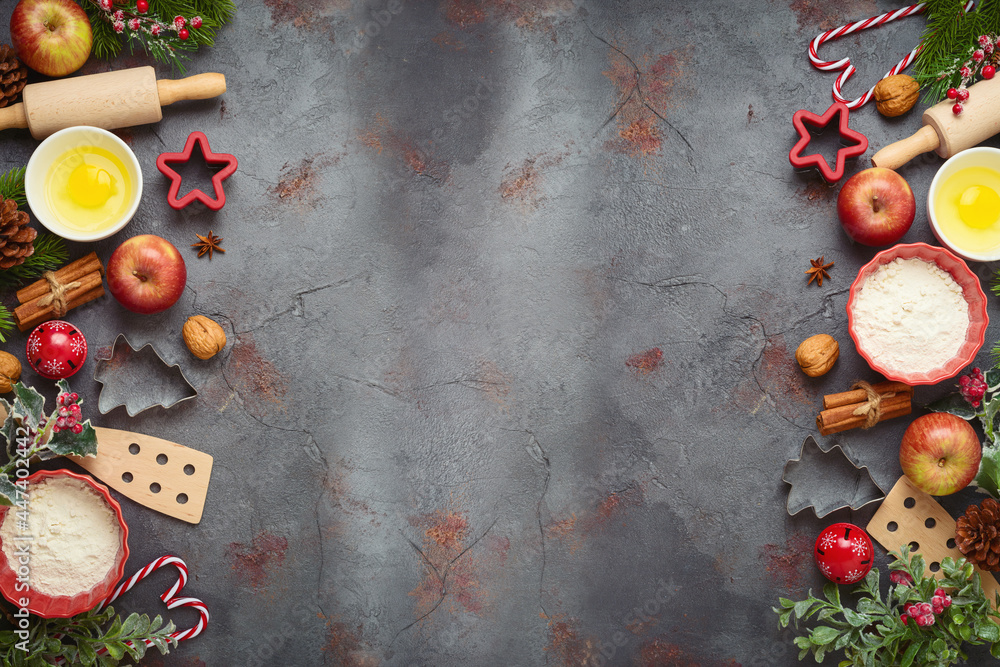 Christmas holiday cooking and baking background with kitchen utensils, iingredients and ornaments. Menu or recipe mock up design