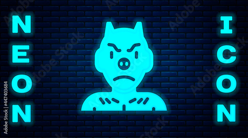 Glowing neon Krampus, heck icon isolated on brick wall background. Horned devil. Traditional Christmas devil. Happy Halloween party. Vector