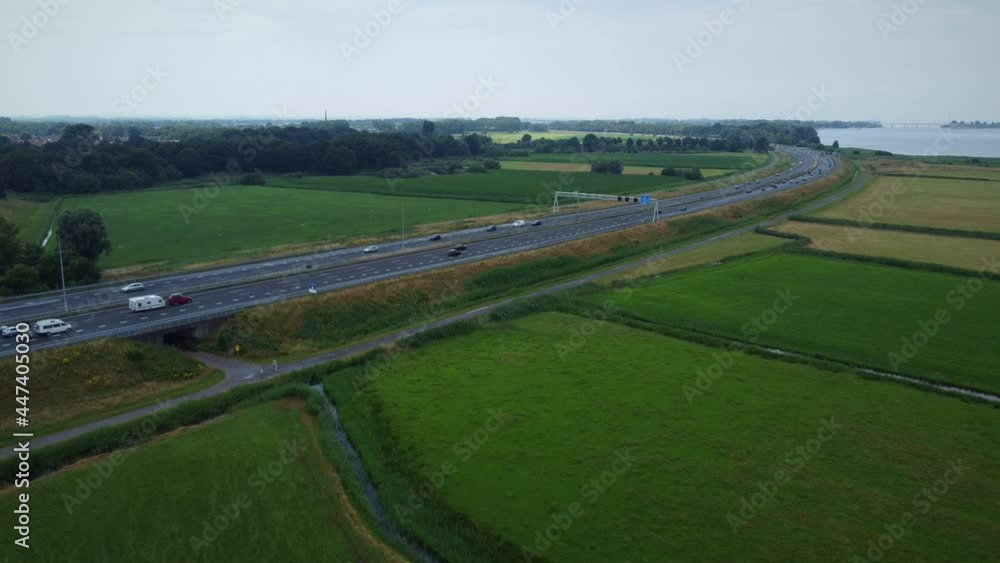 Aerial shot of motorway in the Netherlands, dolly out. Aerial shot of motorway in the Netherlands, dolly out.