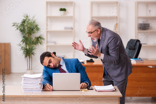 Two employees working in the office