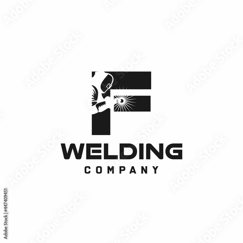 Letter F welding logo, welder silhouette working with weld helmet in simple and modern design style art