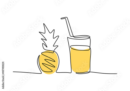 Pineapple and a glass of ju...