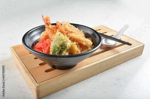 japanese deep fried tempura prawn and vegetables rice bowl in black bowl in white marble healthy poke bowl menu photo