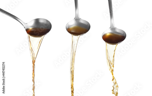 Konstfotografi Dipper pouring noodle soup on white background, Soup for sukiyaki from chicken a