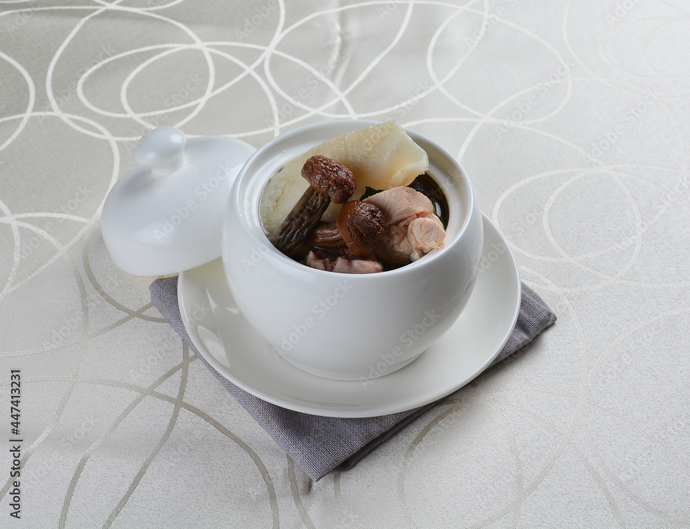chinese superior double boiled truffle seafood scallop fish maw chicken hot soup with herbal in white background asian halal seafood menu chinese superior double boiled truffle seafood scallop fish maw chicken hot soup with herbal in white background asian halal seafood menu