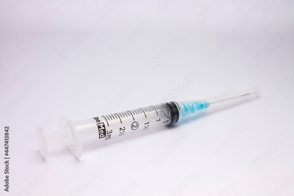 syringe with a needle isolated on white background syringe with a needle isolated on white background