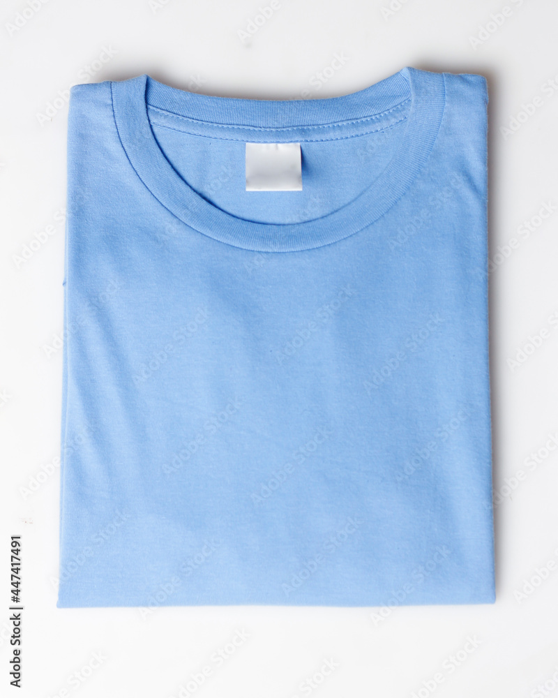 Light blue plain t-shirt mockup template. Plain t-shirt isolated on white background. Clothing for everyday. Perfect for your ad space. Space for your logo. Plain t-shirt for everyday wear. Focus blur Light blue plain t-shirt mockup template. Plain t-shirt isolated on white background. Clothing for everyday. Perfect for your ad space. Space for your logo. Plain t-shirt for everyday wear. Focus blur