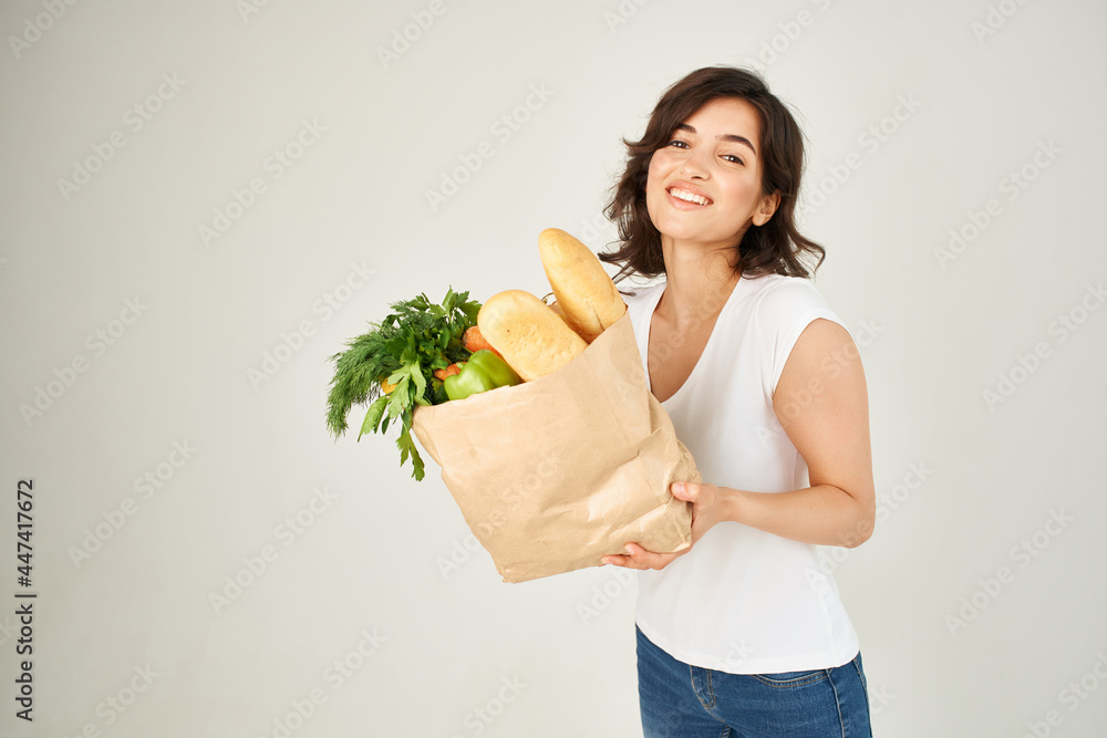 woman with package of groceries supermarket delivery service woman with package of groceries supermarket delivery service