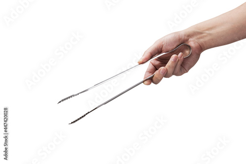 hand holding tongs on a white background