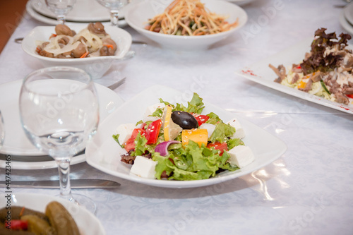 Festive table of salads and appetizers for event