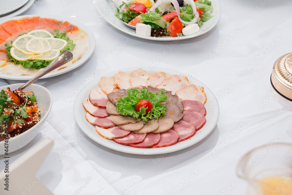Festive table of salads and appetizers for event