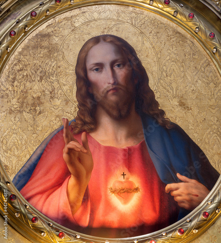 Photography VIENNA, AUSTIRA - JULI 5, 2021: The Heart of Jesus painting in Jesuitenkirche church by Leopold Kupelvieser from 19