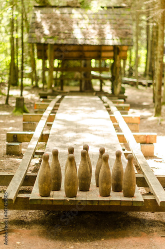 Wooden bowling area and pins, Kabile, Latvia. photo