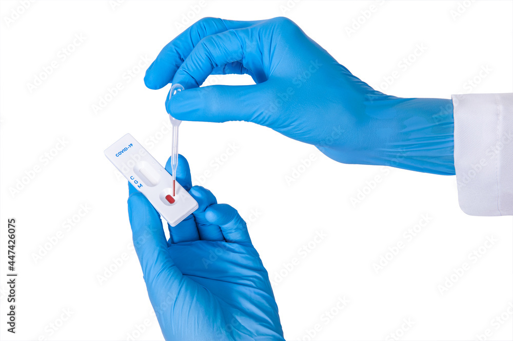 Doctor making a rapid test kit for viral disease COVID19 nCoV Laboratory card kit test for